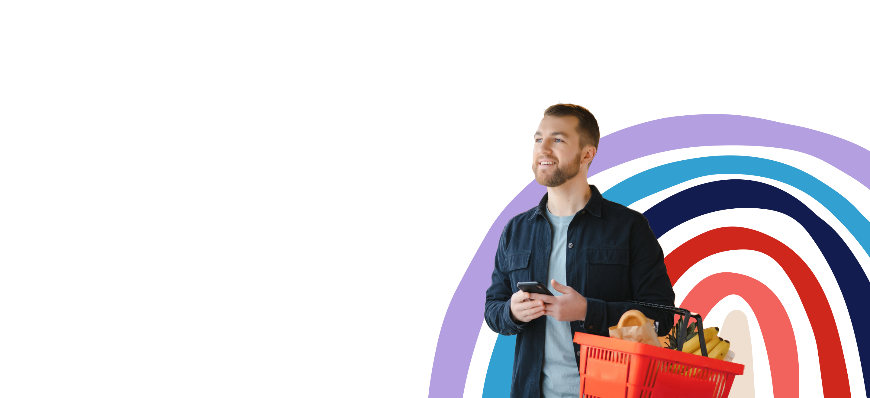 man with grocery shopping basket looking optimistic about finances