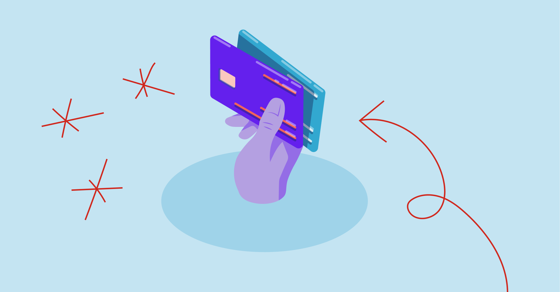 hand holding up debit and credit cards