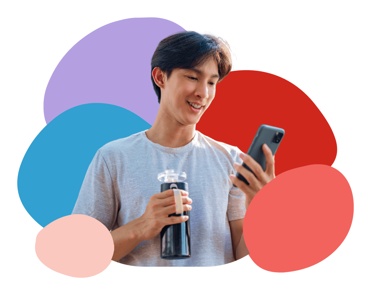 young man looking at his phone