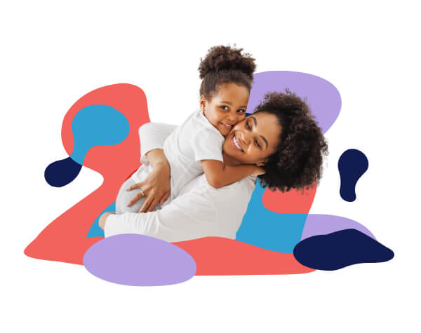 woman embracing young daughter, enjoying life